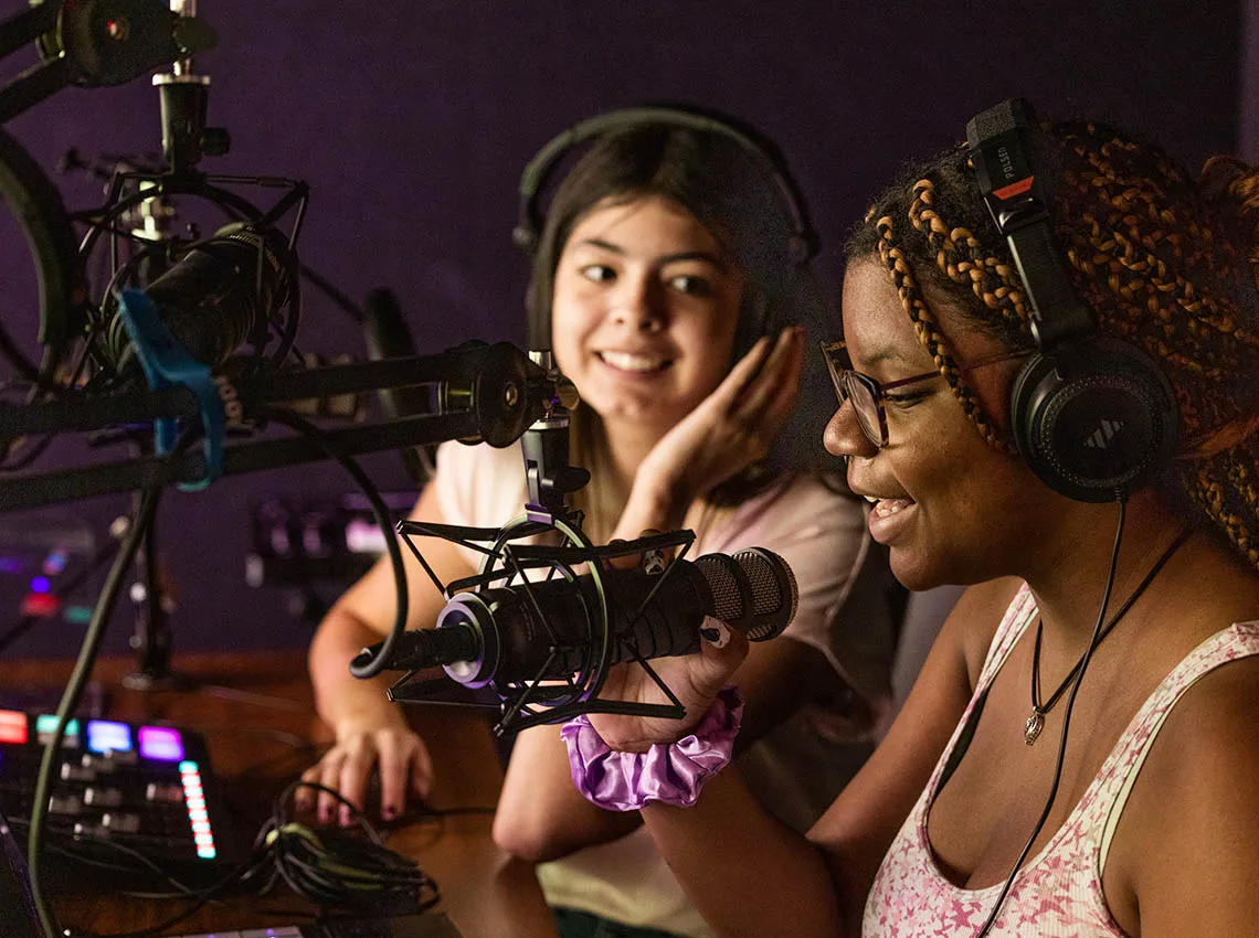 Students Annissa Lopez and Vanessa Campbell recording a podcast.