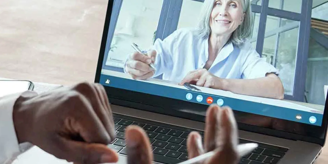 Two people having a virtual meeting.