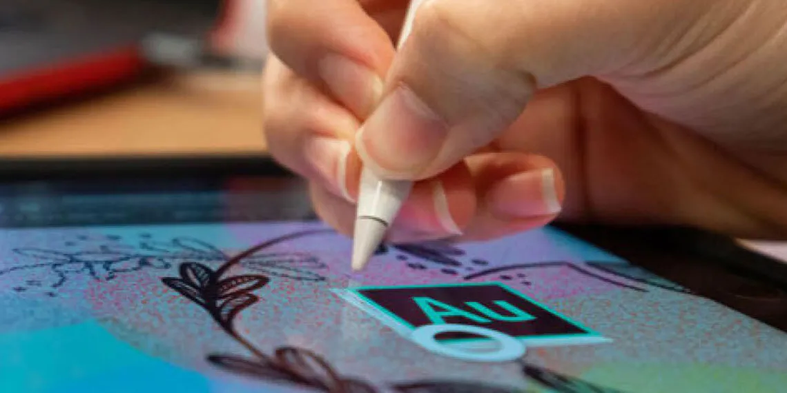 A student using Adobe mobile apps on her iPad with her Apple pencil.
