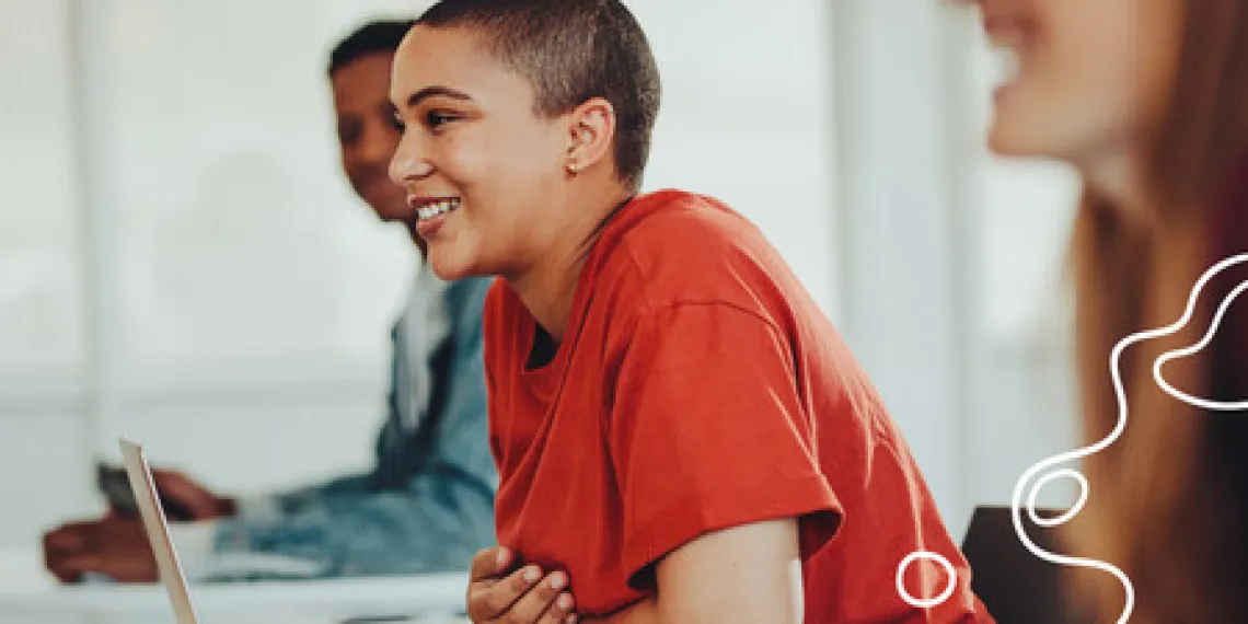 Smiling girl in University classroom. Abstract graphic white lines in the bottom right corner.