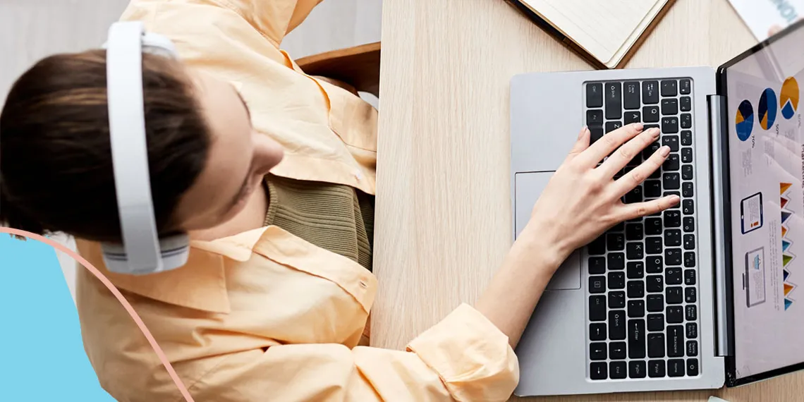 A UArizona instructor evaluates and revises her online course on her laptop.